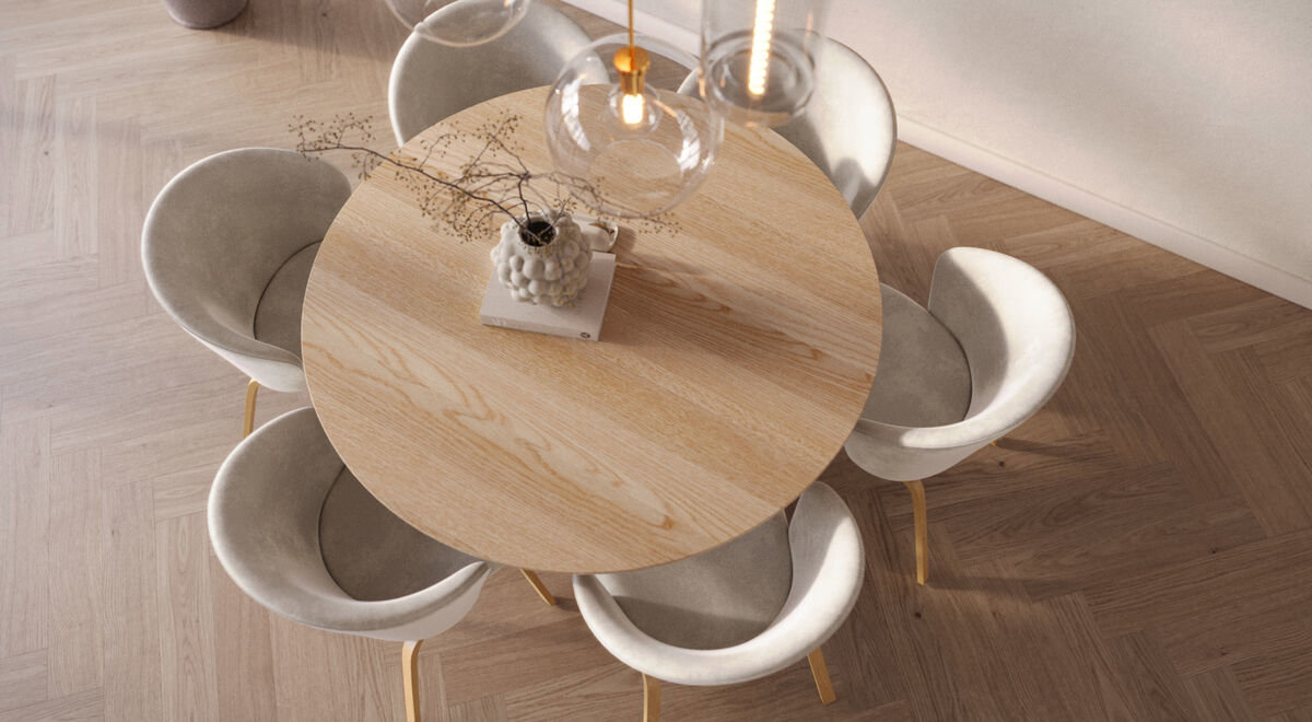 Bovenaanzicht van een ronde eettafel met 6 stoelen