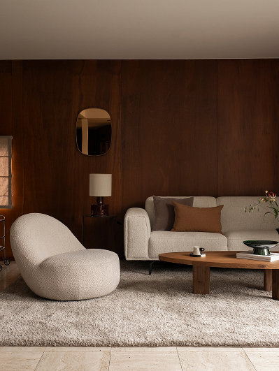 Woonkamer inspiratie retro stijl met fauteuil