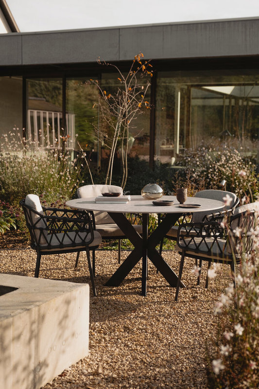 Round ceramic garden table with chairs