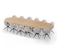 Deze afbeelding is een vergadertafel te zien met een halve cirkel vorm. Het onderstel bestaat uit een houten poot met daaraan 12 vergaderstoelen.