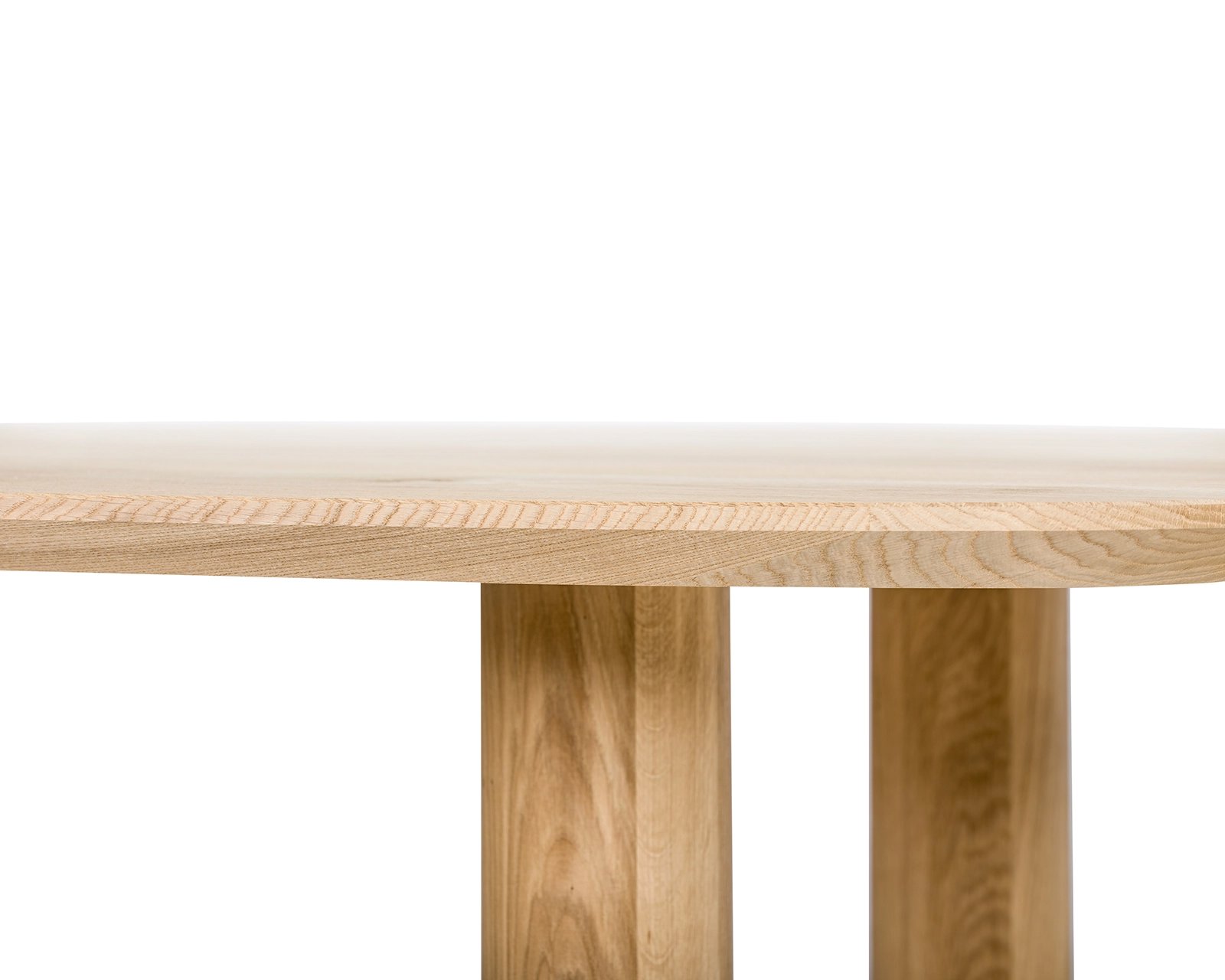 Pebble shaped oak dining table Pippa